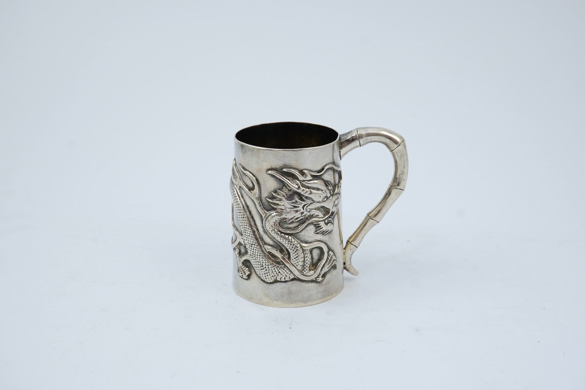 A late 19th/early 20th century Chinese Export silver small mug, by Wang Hing, Hong Kong